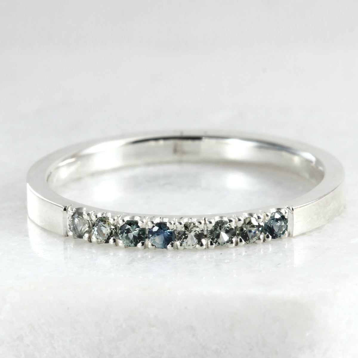 A sterling silver stacking ring with Montana Sapphires
