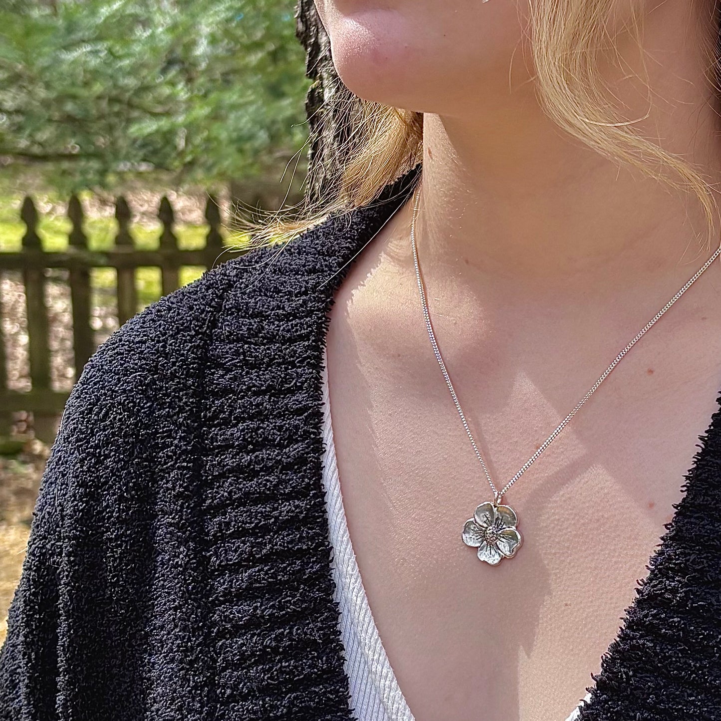 Wild Bloom Pendant in sterling silver, shown on a model