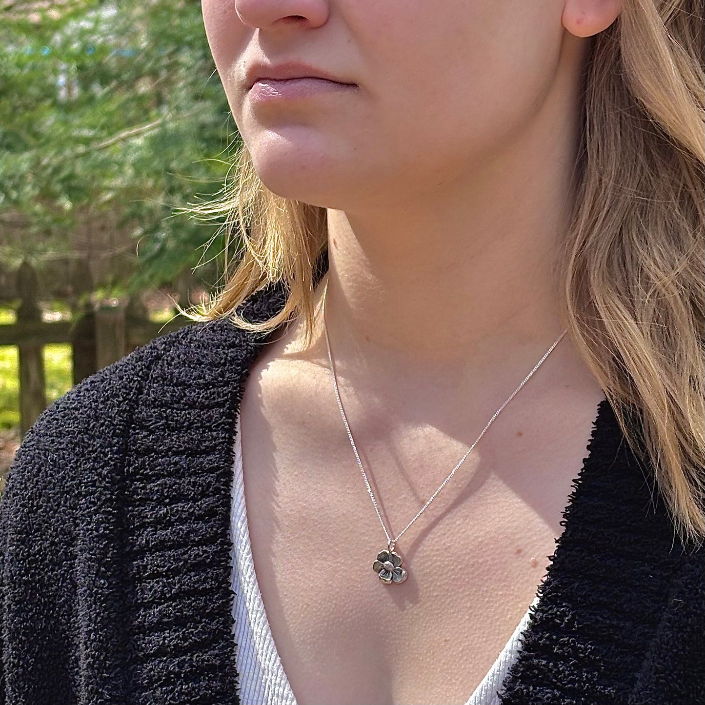 Wild Bloom Small Pendant in sterling silver, handcrafted flower necklace, shown on model
