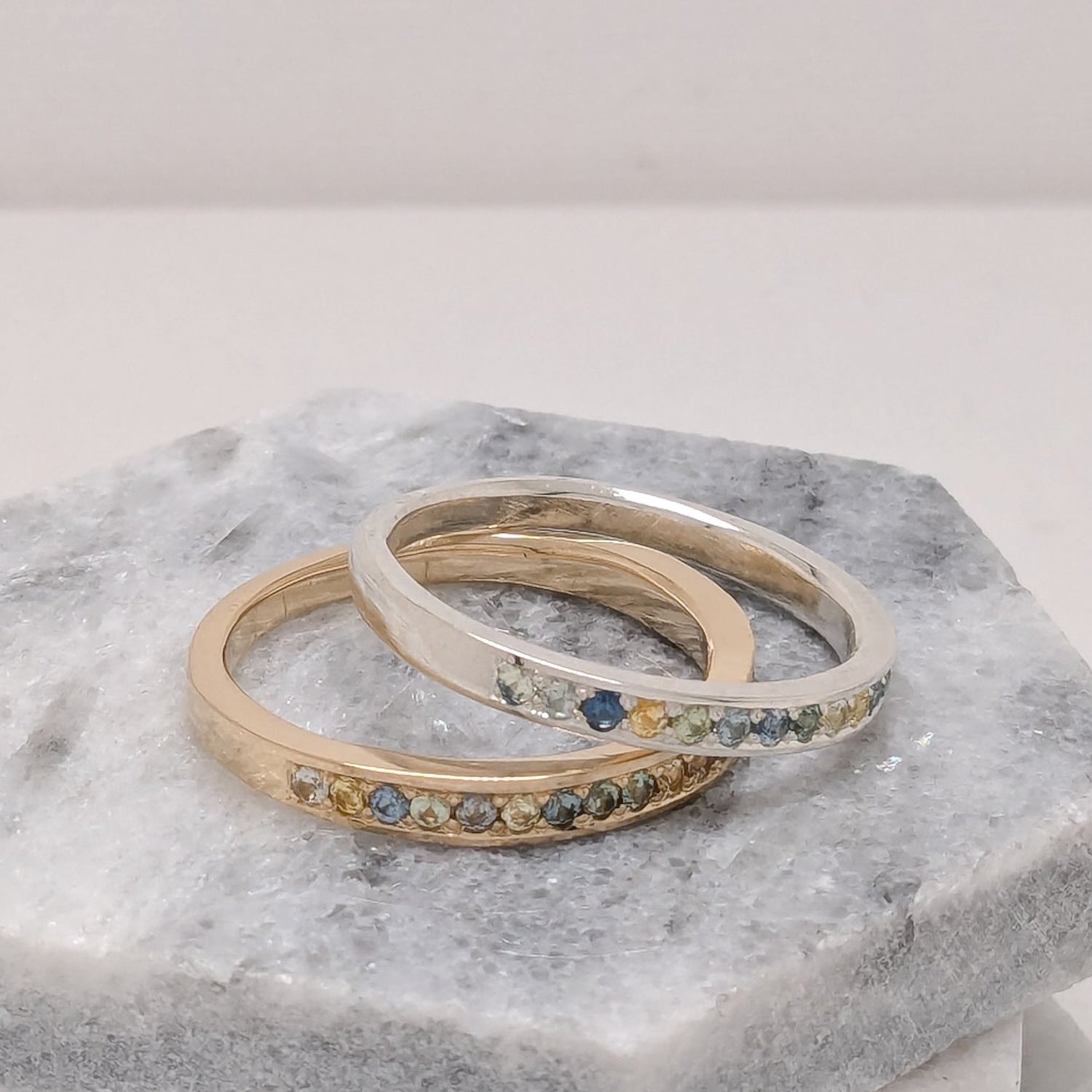 Montana sapphire stacking rings in silver and gold