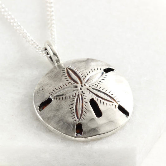 Sterling silver hand fabricated sand dollar pendant
