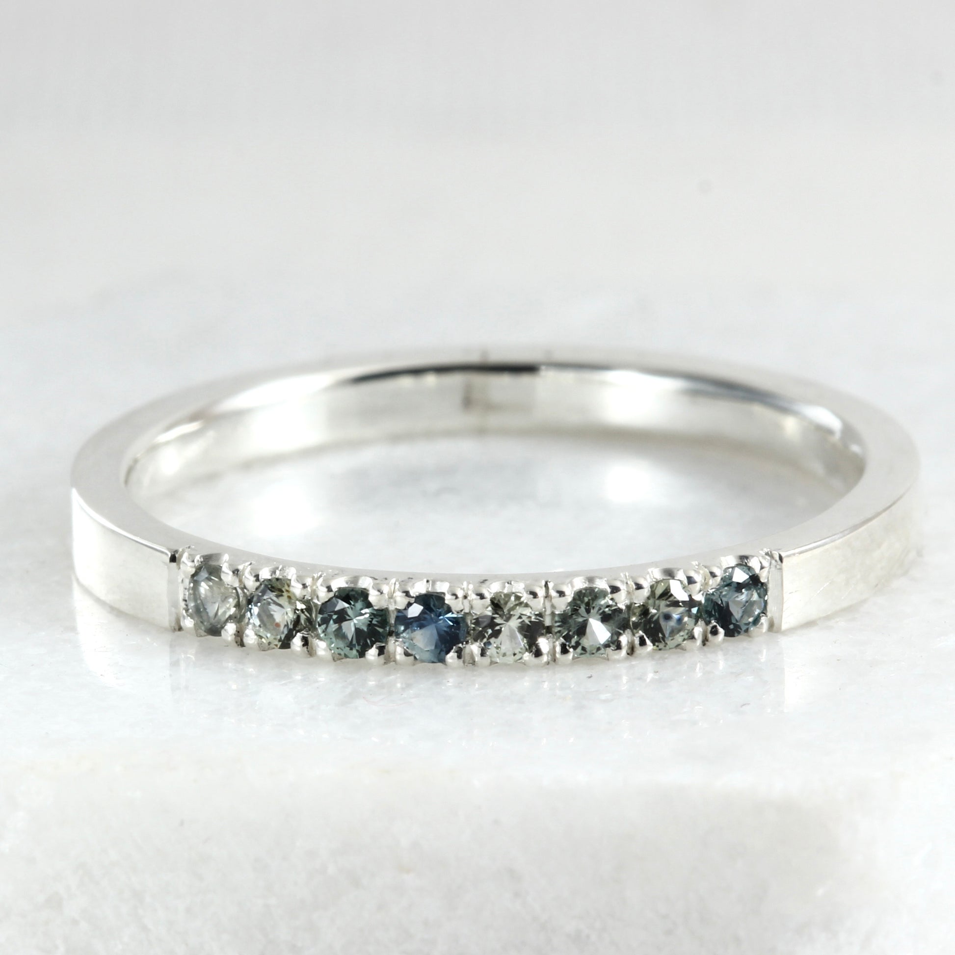 A sterling silver stacking ring with Montana Sapphires
