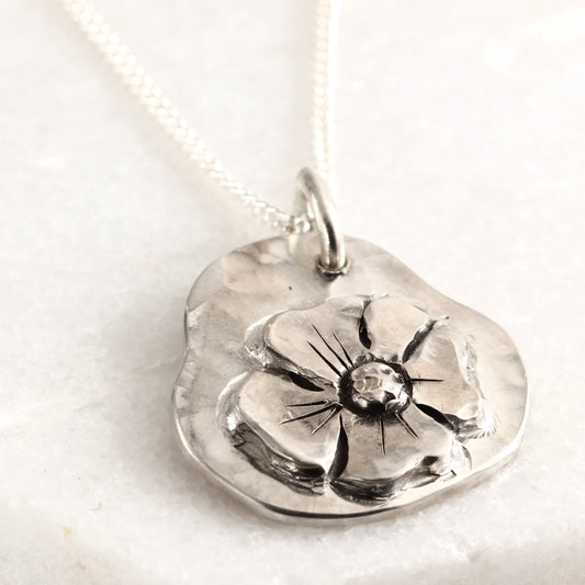 Wild Bloom Freeform Pendant in sterling silver, handcrafted floral pendant, on white background