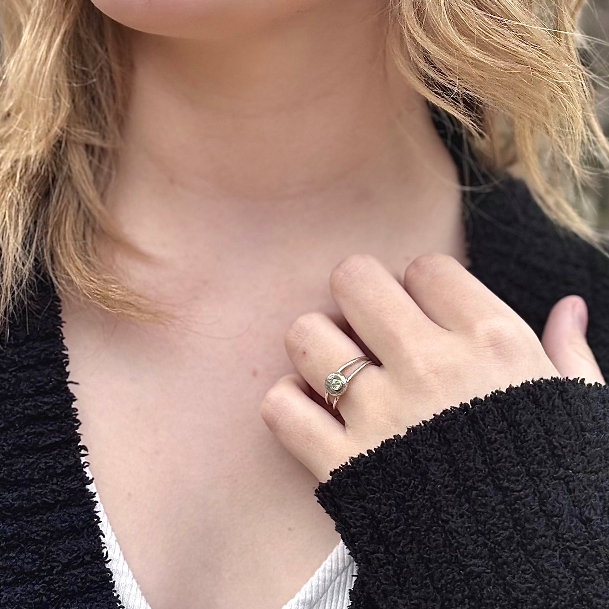 Wild Bud Ring in sterling silver with Montana sapphire, shown on a model