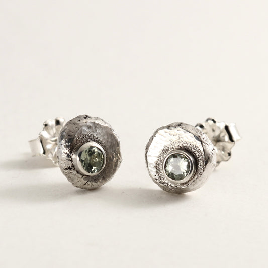 Wild Bud Stud Earrings in sterling silver with Montana sapphires, shown on a white background